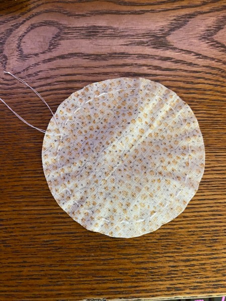 Sewing the center piece of the quilt block.