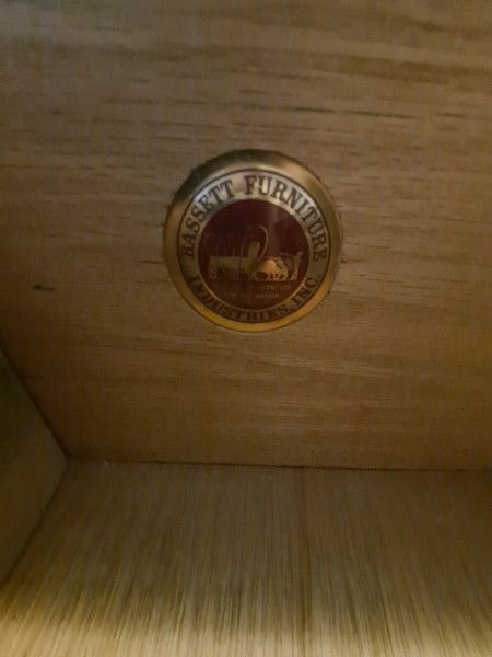 The Bassett logo inside a drawer.