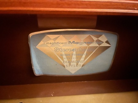 The Magnavox logo on a record player.