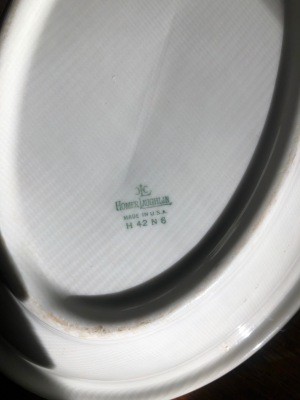 The marking on the back of a china plate.