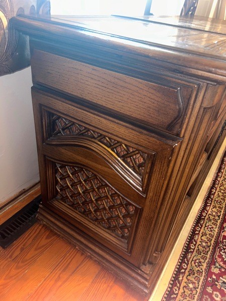 The side of a stereo console.