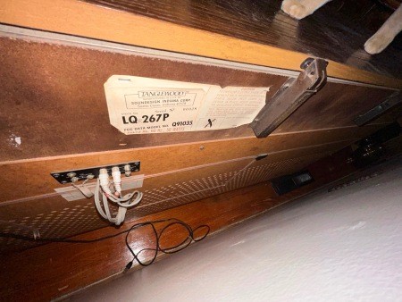 The back of a stereo console.