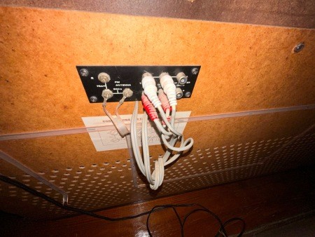 The back of a stereo console.