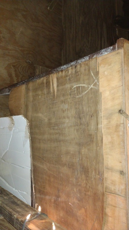 The back of a wooden dresser.