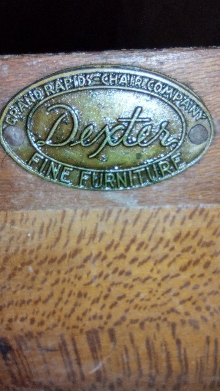 Manufacturer's information on a piece of furniture.