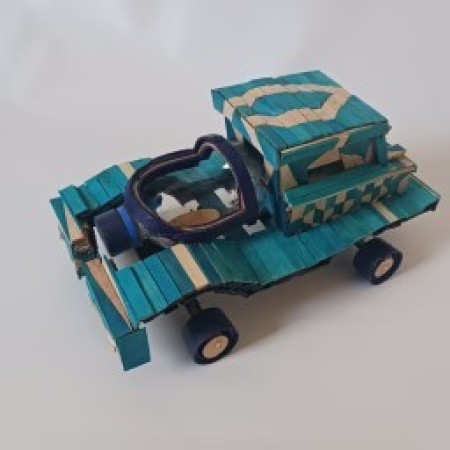 A toy car made from recycled materials.