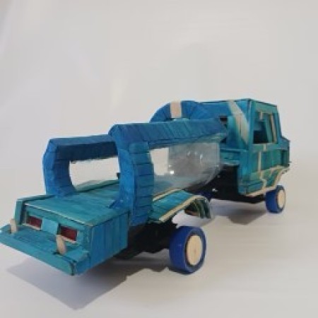 A toy car made from recycled materials.